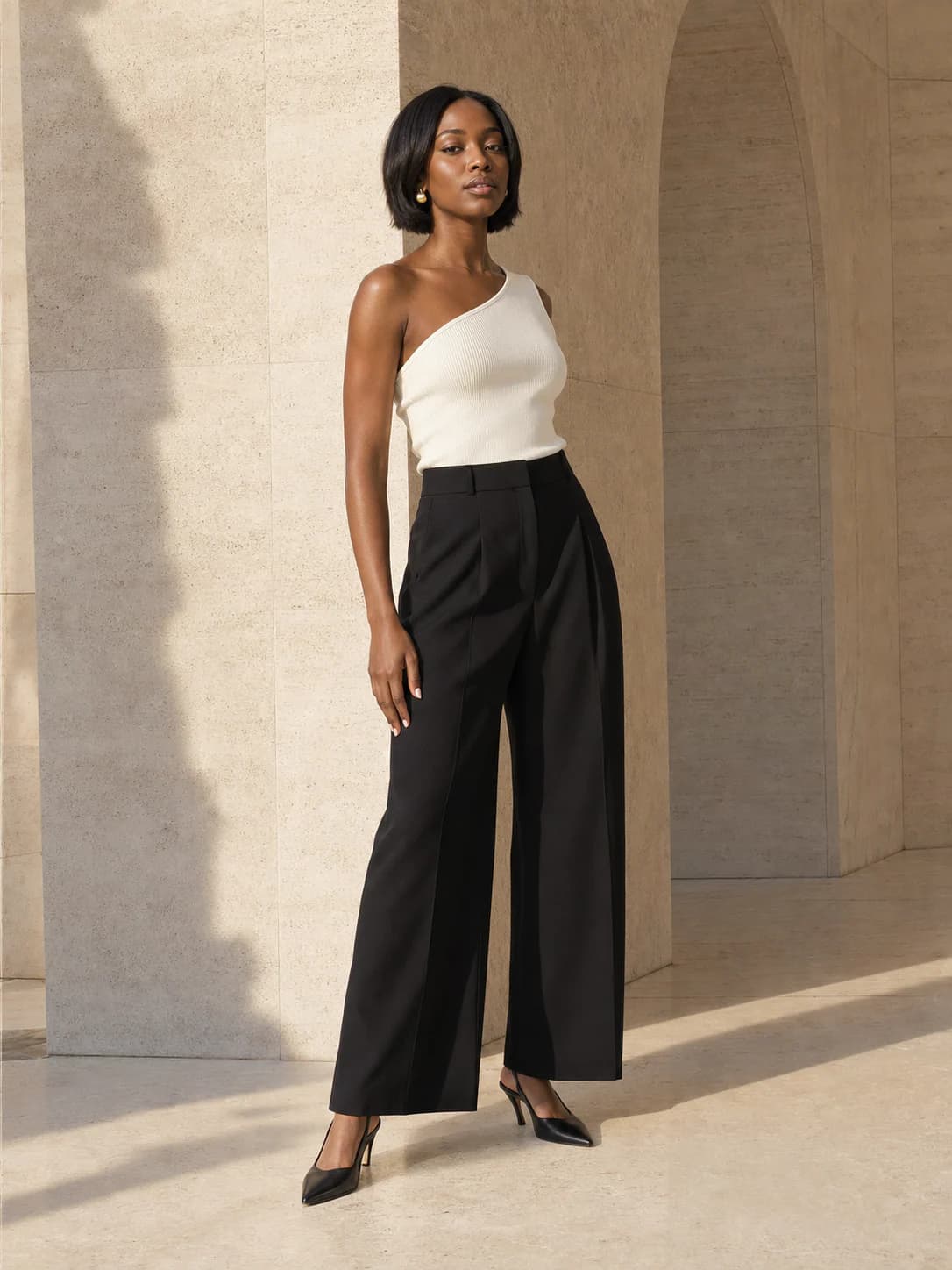 Original full-body city tailoring photo in a travertine gallery